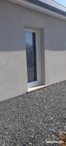 a window on the side of a building at La Source 