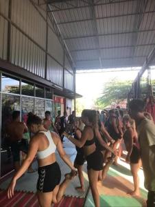 a group of people in bathing suits in a building at Natasha RestHouse in Pulau Langkawi +10 photos