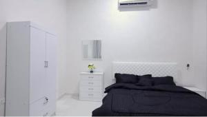 Giường trong phòng chung tại Two bedrooms - Waeb Holiday Home