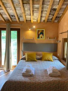 Postel nebo postele na pokoji v ubytování Dolce Vita in Tuscany B&B