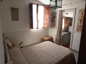 Posteľ alebo postele v izbe v ubytovaní La Hacienda Del Campo