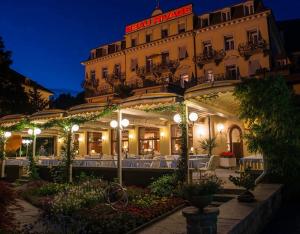 Giardino di Romantik Hotel Beau Rivage Weggis