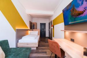 Voodi või voodid majutusasutuse Hotel Sandkorn toas