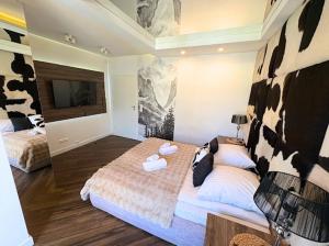 Posteľ alebo postele v izbe v ubytovaní Apartament Silver - Stara Polana Spa