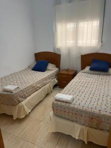 Postel nebo postele na pokoji v ubytování Marina Dor Oropesa Apt 1 Linea