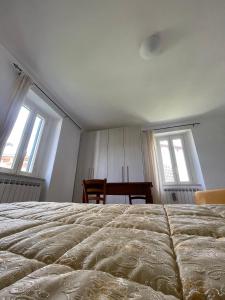 Postel nebo postele na pokoji v ubytování Gran sasso white house