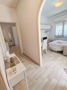 Posteľ alebo postele v izbe v ubytovaní Casa La Cartolina