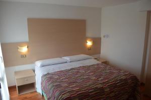 Voodi või voodid majutusasutuse Hotel Paradiso toas