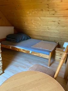 Postel nebo postele na pokoji v ubytování DorJan - Pokoje Gościnne