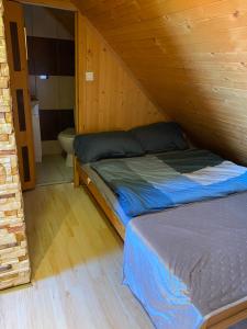 Postel nebo postele na pokoji v ubytování DorJan - Pokoje Gościnne