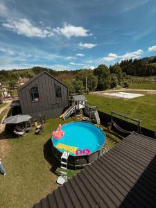 an overhead view of a backyard with a swimming pool at Weekend house in Verkhovyna