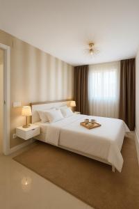 Кровать или кровати в номере Luz y Mar Barcelona