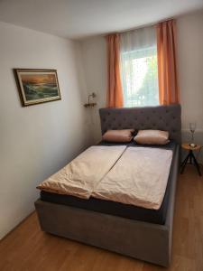 Postel nebo postele na pokoji v ubytování Apartmenthaus Fa