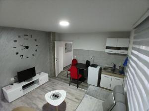 Un lugar para sentarse en Adagio Studio Apartment