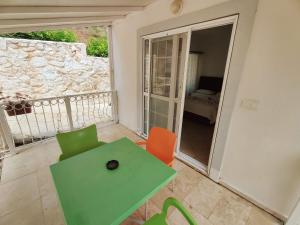 A balcony or terrace at Bucak Apart Hotel Göcek & Beach