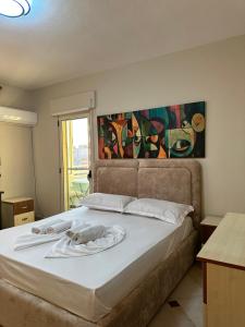 Postel nebo postele na pokoji v ubytování Coastal Haven Apartment
