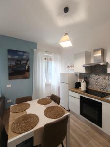 Η κουζίνα ή μικρή κουζίνα στο Oltremare FRONTE SPIAGGIA