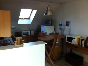 Η κουζίνα ή μικρή κουζίνα στο Grand Appartement Chill