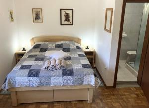 Postel nebo postele na pokoji v ubytování Homestead Zatrnik near Bled