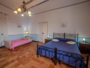 Voodi või voodid majutusasutuse La Suite di Arpino toas