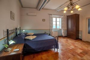 Voodi või voodid majutusasutuse La Suite di Arpino toas