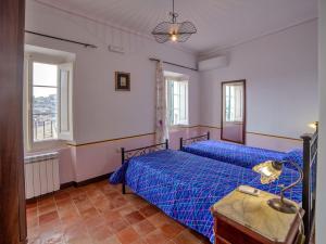 Voodi või voodid majutusasutuse La Suite di Arpino toas