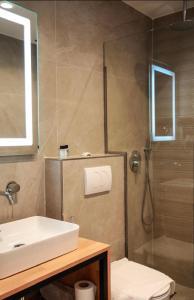 Koupelna v ubytování Hotel Resol 2