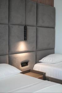 Postel nebo postele na pokoji v ubytování Hotel Resol 2