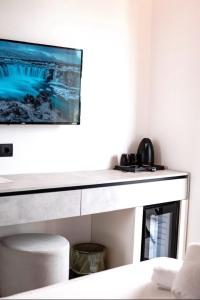 TV a/nebo společenská místnost v ubytování Hotel Resol 2