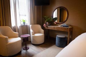 Posezení v ubytování The Hatmaker Boutique Hotel