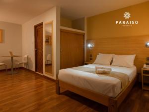 Cama o camas de una habitación en Hoteles Paraiso CHICLAYO