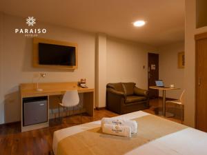 Cama o camas de una habitación en Hoteles Paraiso CHICLAYO