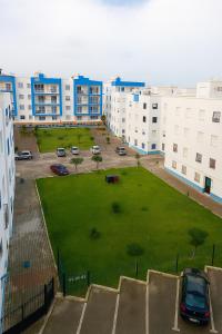 an aerial view of a park in a city at Appartement À Martil in Martil