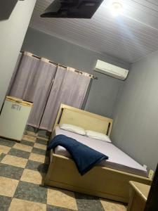 Postel nebo postele na pokoji v ubytování Hotel Potiguar