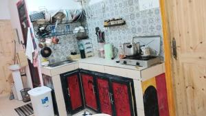 Kuchyň nebo kuchyňský kout v ubytování Sidi Bouzid Guesthouse