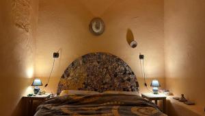 Postel nebo postele na pokoji v ubytování Sidi Bouzid Guesthouse