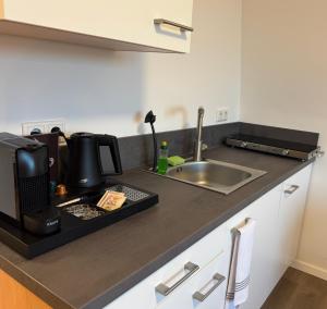 Kuchyň nebo kuchyňský kout v ubytování Urbanes Apartment Bielefeld-Bethel