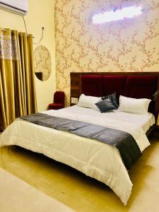 Voodi või voodid majutusasutuse Heaven hills resort Pushkar toas
