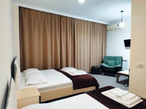 Katil atau katil-katil dalam bilik di Chill Out Hotel