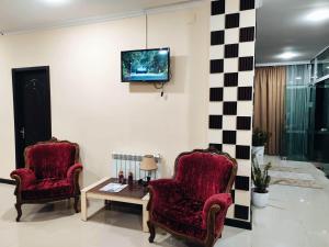 Televisyen dan/atau pusat hiburan di Chill Out Hotel