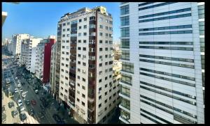 an overhead view of a tall building in a city at Cozy Studio Boulevard Anfa étg10 in Casablanca