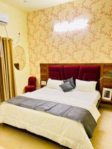 Postel nebo postele na pokoji v ubytování Heaven hills resort Pushkar
