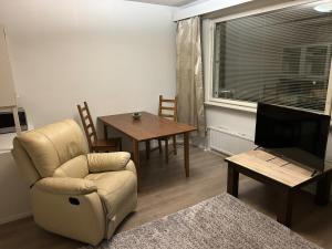 Televisyen dan/atau pusat hiburan di Studio 44m2 by the lake