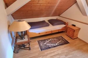 Ένα ή περισσότερα κρεβάτια σε δωμάτιο στο Landhaus Sauerburgblick