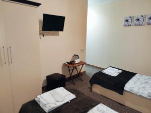 Katil atau katil-katil dalam bilik di Chill Out Hotel