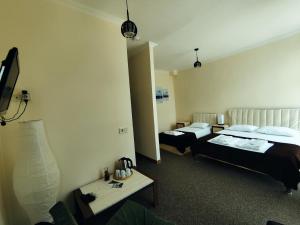 Katil atau katil-katil dalam bilik di Chill Out Hotel