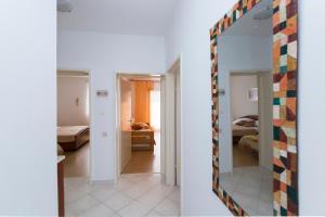 Ein Bett oder Betten in einem Zimmer der Unterkunft Gianna Apartment Labin