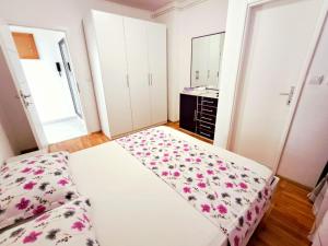 Postel nebo postele na pokoji v ubytování Apartment Eva