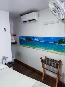 Cama ou camas em um quarto em Posada San Nicolas