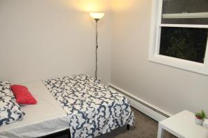 A bed or beds in a room at Nomadnest housing